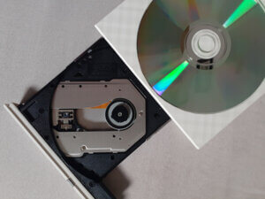 photo of a CD and a CD player